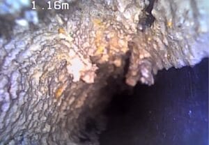 Visszatérő dugulás kamerás csatornavizsgálata Gödöllőn bontás nélküli feltárással